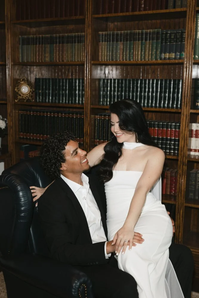 couple posing in chair at luxmore grande state engagement session