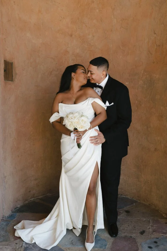 couple looking at each other in howey in the hills engagement session