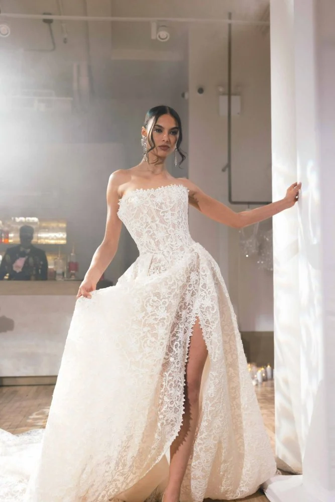 model posing in wedding dress at nyc spring wedding dress fashion show