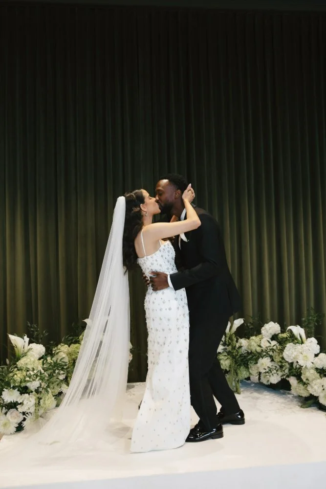 couple kissing in editorial destination wedding