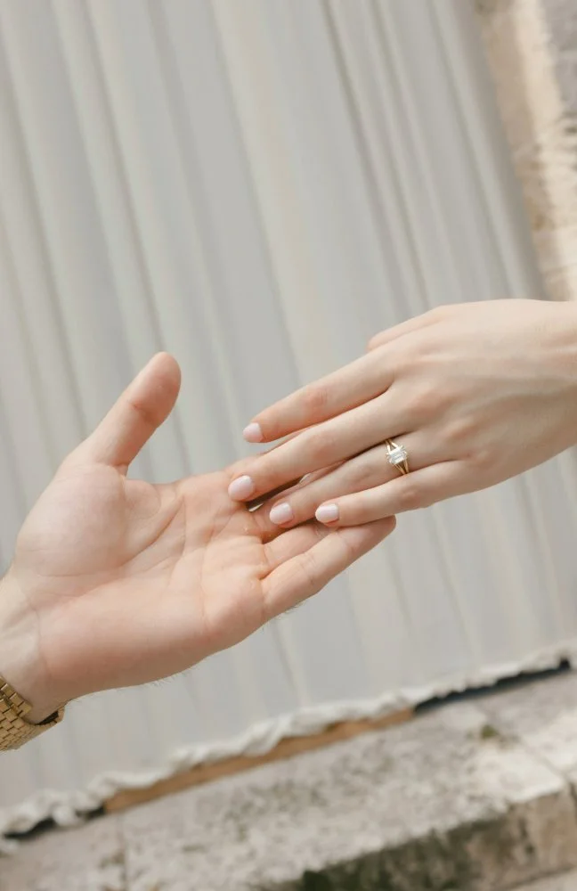 close up of couple holding hands in vizcaya museum couples photo session
