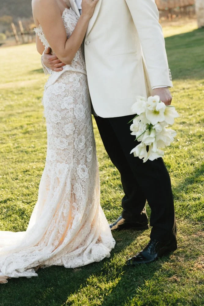close up of couple hugging during sunstone villa styled wedding shoot