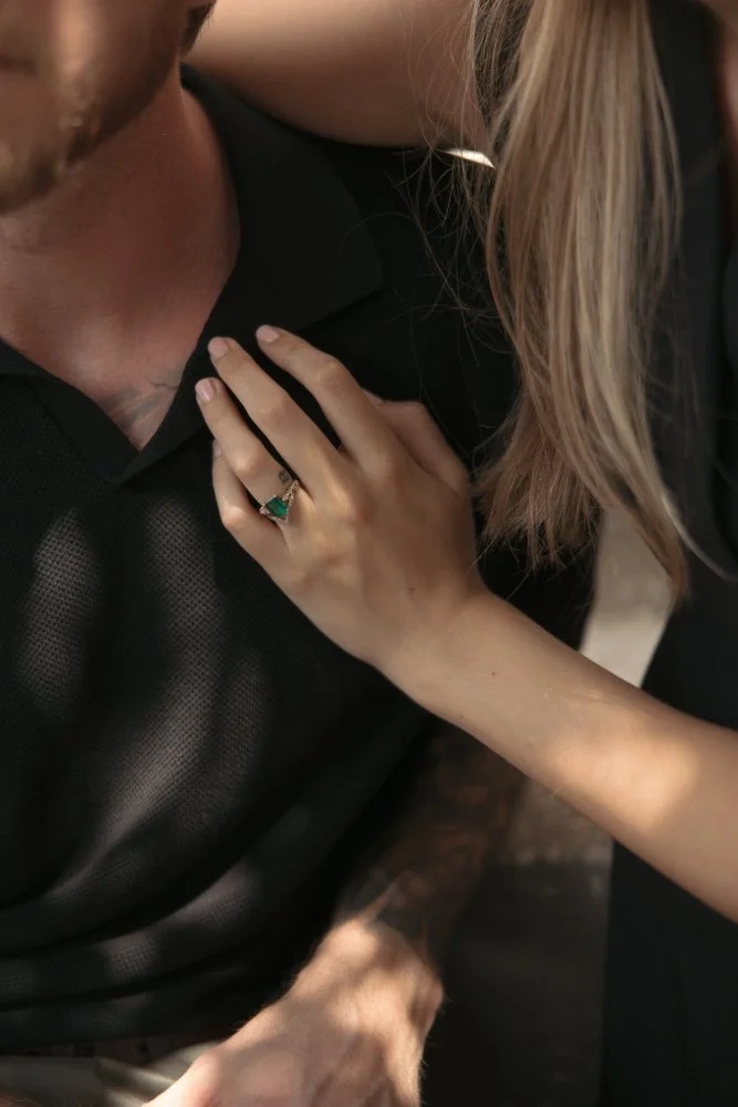 close up of engagement ring in winter park couple photo session