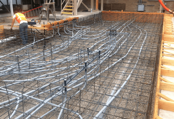 conduits being laid out during construction