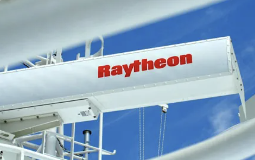 RAYTHEON logo on a white machine