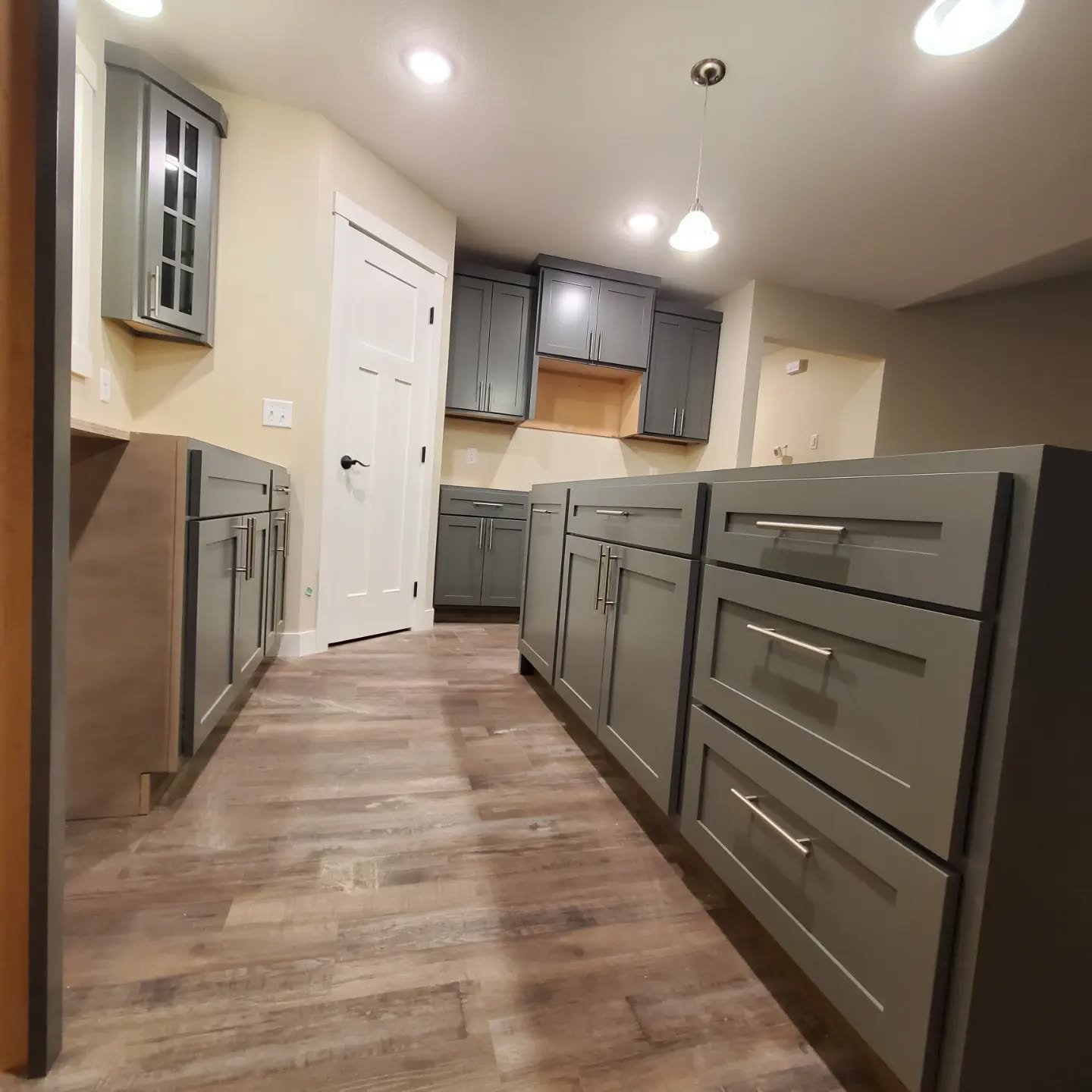 Newest set of cabinets are coming together. These are hard maple with colorized lacquer. The were very challenging to install but I definitely learned a lot. The glass doors really adds a nice touch. Stay tuned for final picture with after appliances