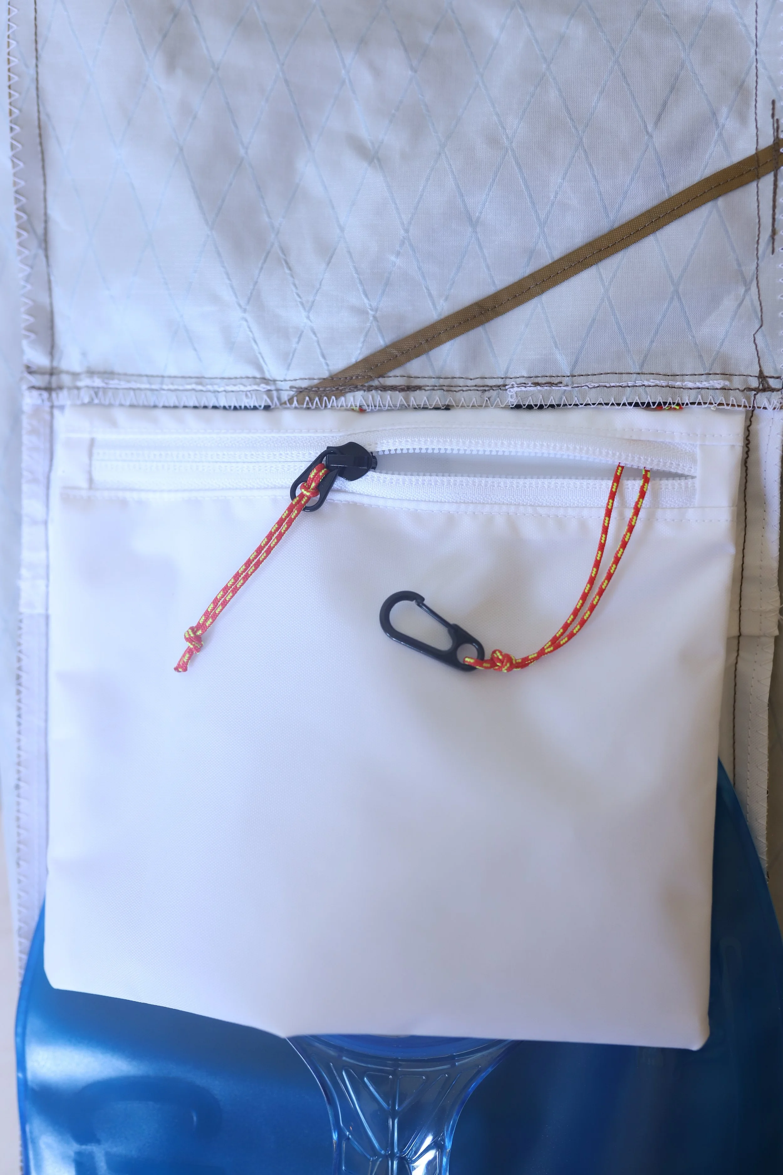 Interior zipper pocket with metal carabiner 