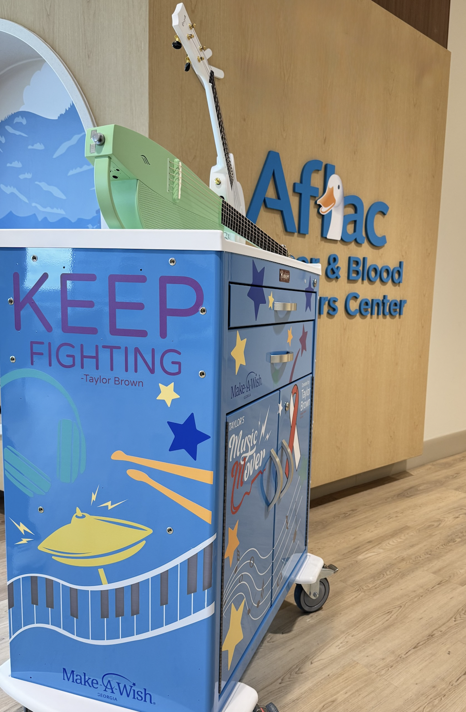 Left side of the cart showing off various instruments and Taylor's quote "Keep Fighting". Taylor told me which colors, font, and quote to use. 