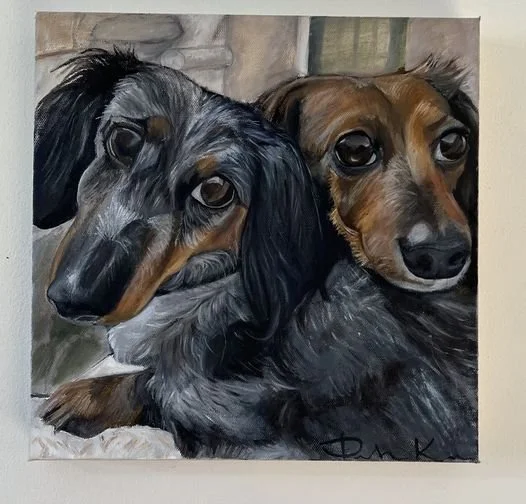 Painting of two dachshund dogs with long bodies and expressive eyes, sitting side by side.