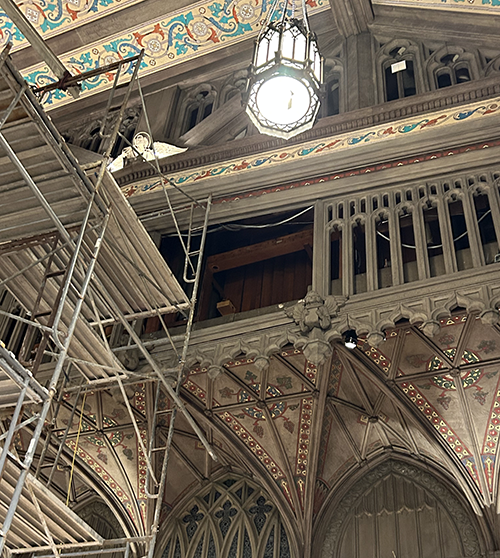 It was necessary to remove entire sections of grillwork in order to access Opus 414's pipes.