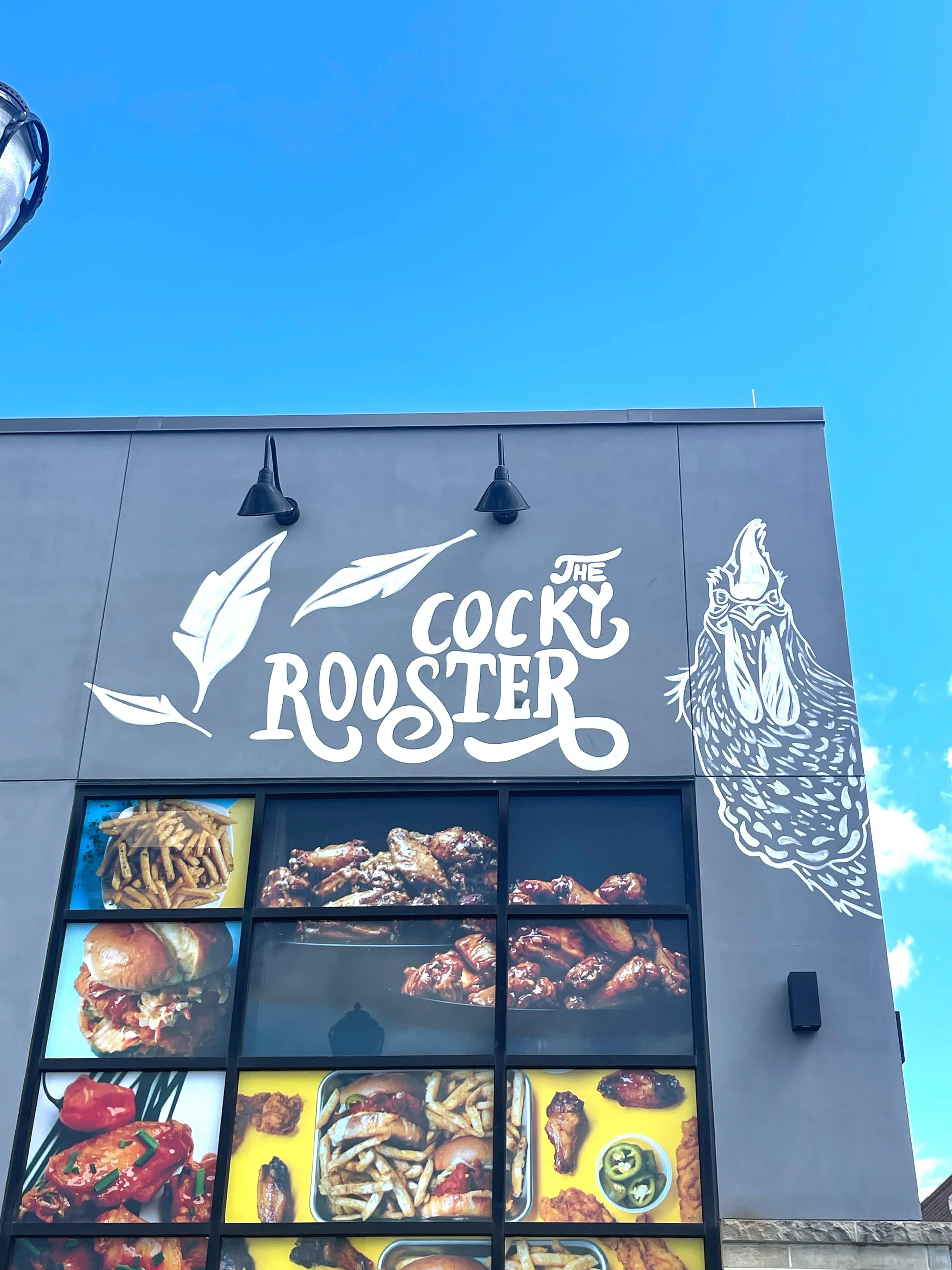 Cocky rooster gate back outside.jpg