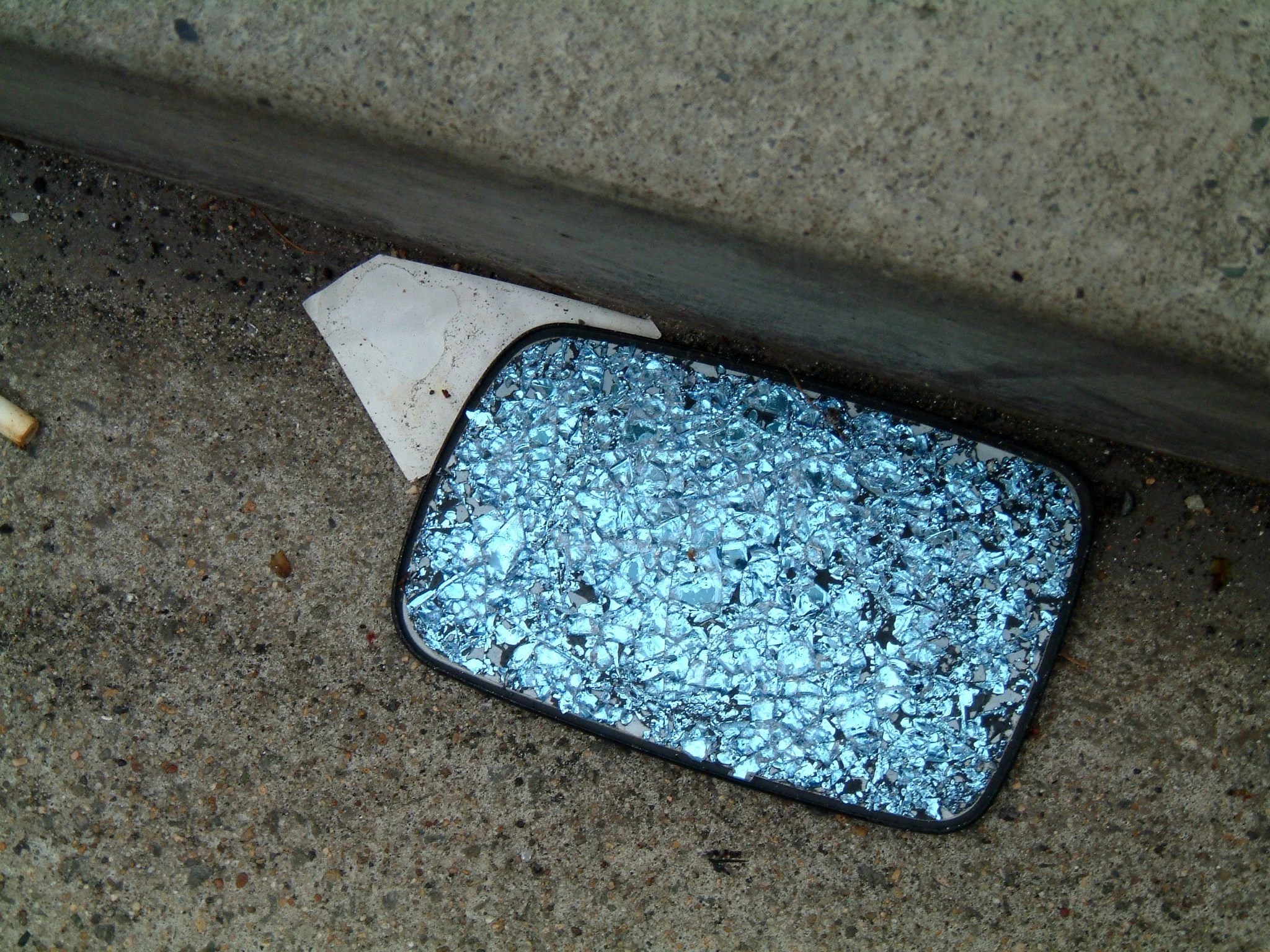 TITLE: Narcissus's New Tokyo Toy

Mirror, mirror on the floor, does anybody want you anymore?  I do...your view is the most honest...the mosaic self looks back upon me...chimeric, kaleidoscopic, fractal...how wonderful to be multi-faceted!