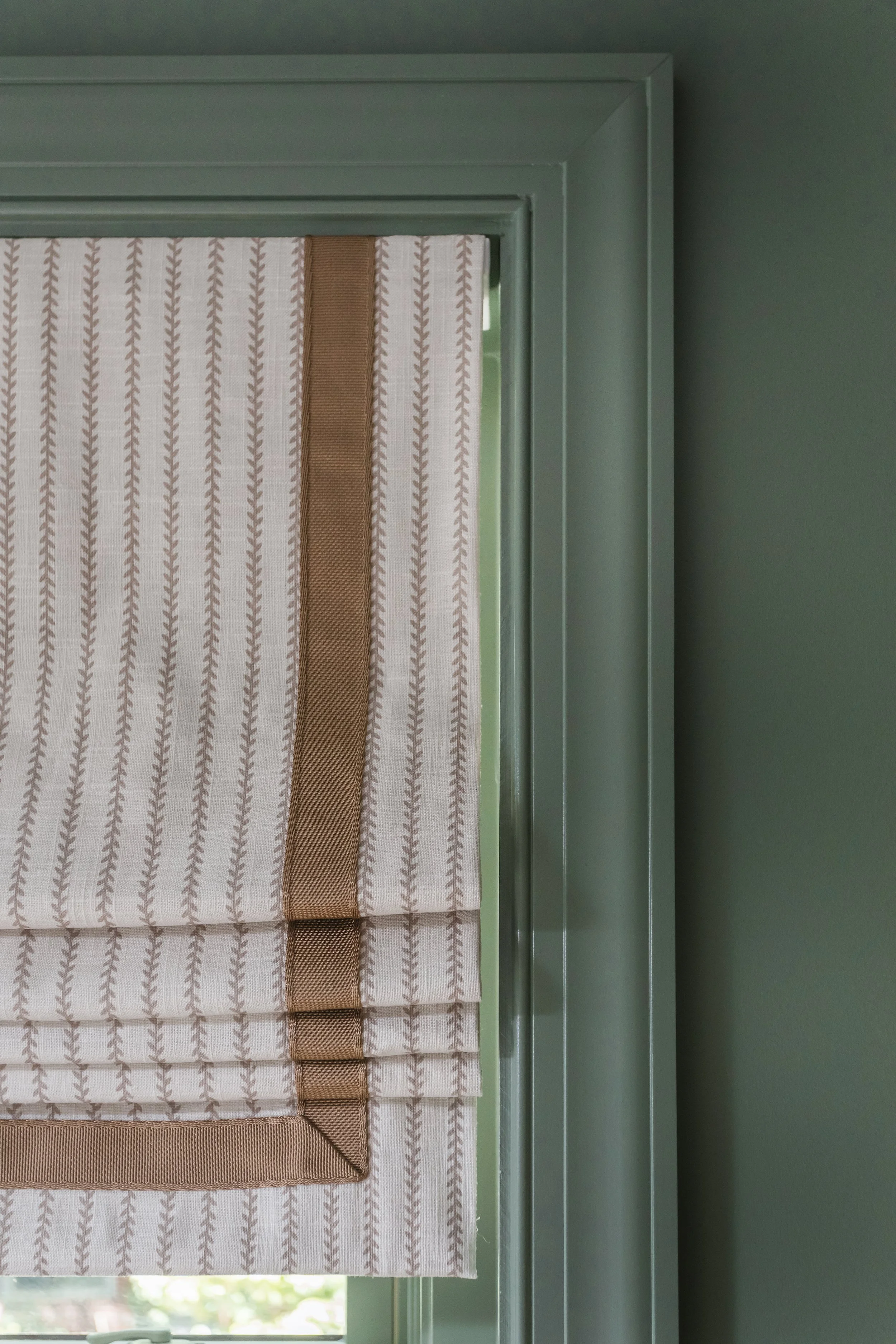Neutral striped custom window coverings that complement an earthy palette 
