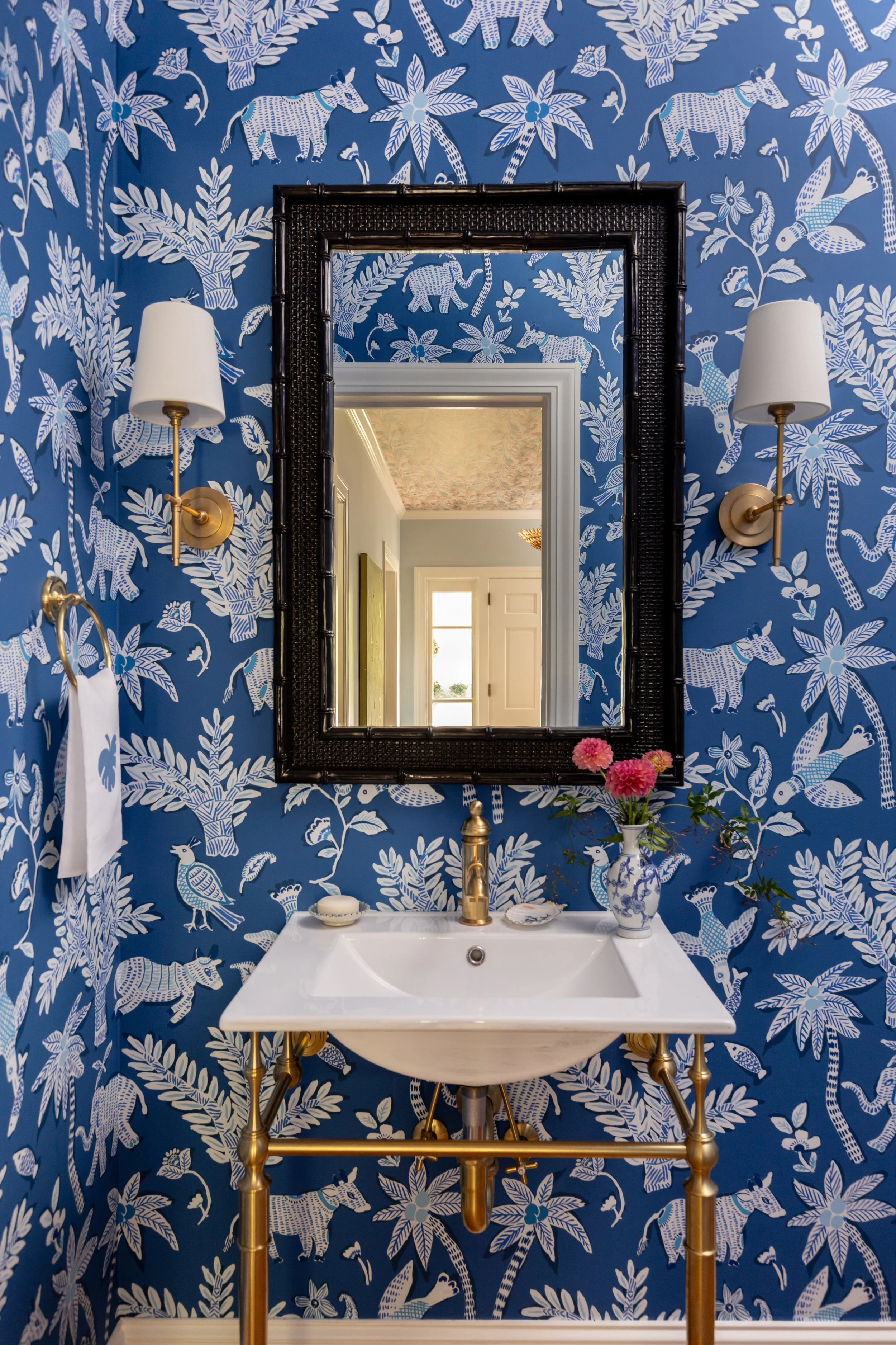 Colorful blue powder room with personality 