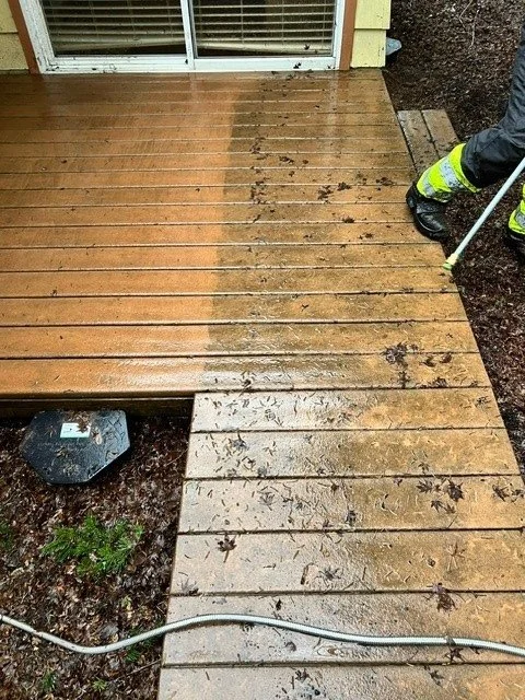 A composite deck being Pressure Washed