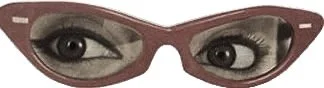 Close-up of a pair of red-tinted glasses with eyes visible through the lenses.