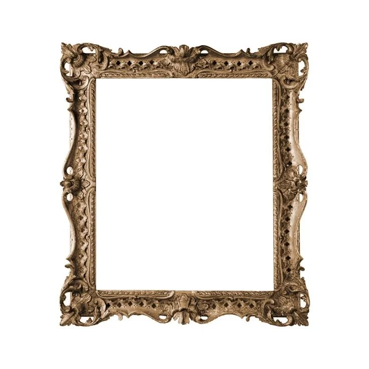 Ornate antique gold-colored picture frame with intricate carvings.