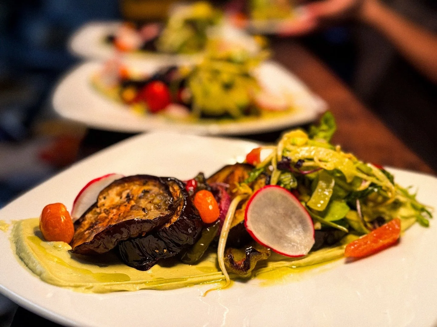 Layers of perfectly roasted eggplant, silky cashew &amp; avocado cream, and a fresh crunch of circus greens and fennel salad.
Finished with sweet bell peppers for that pop of flavour. Light, vibrant, and seriously satisfying!

Check out our new menu 