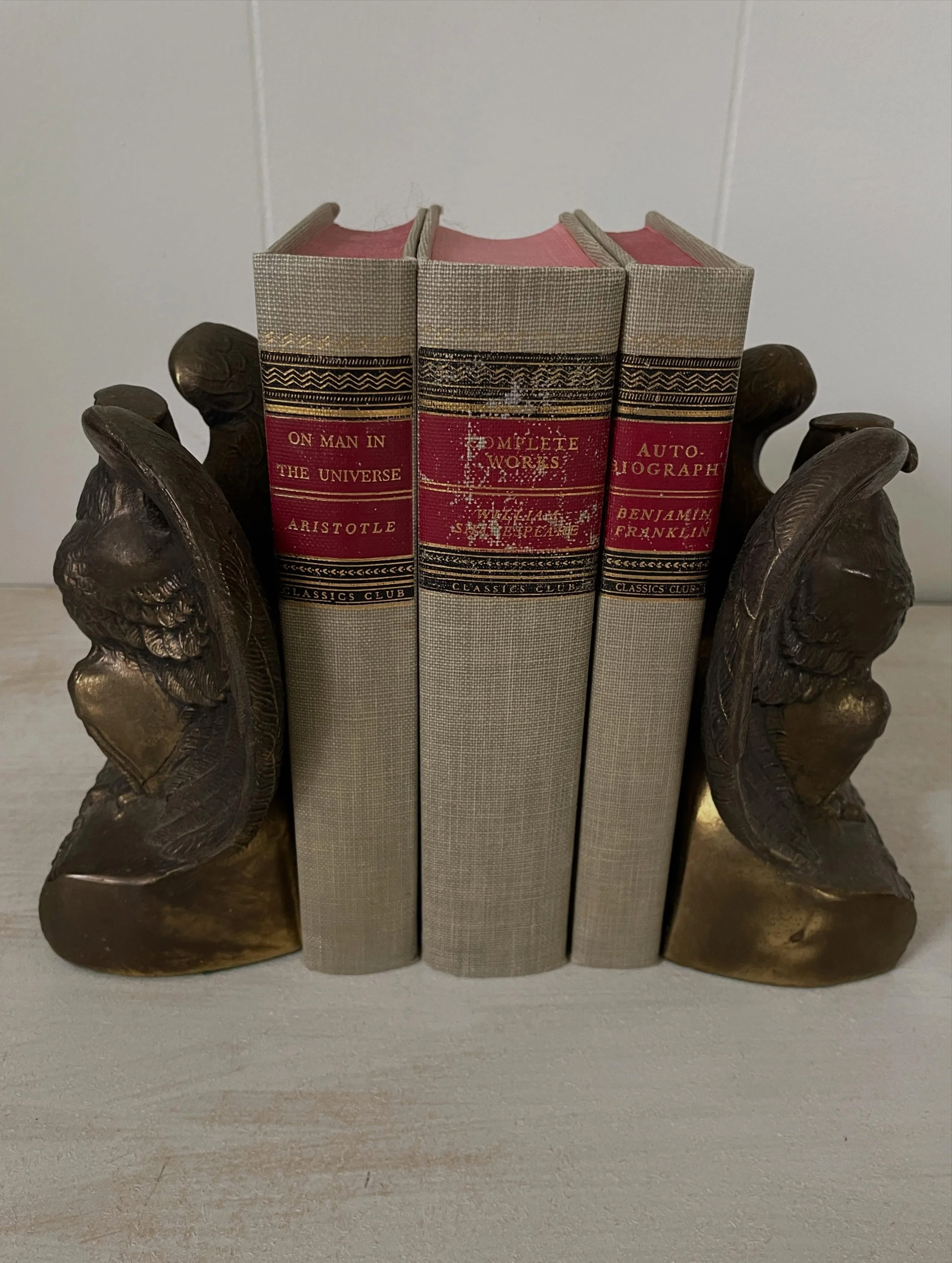 A pair of American classics.

These vintage brass eagle bookends date to the 1960s and carry the kind of presence that instantly elevates a shelf, study, or library. Rich with patina and beautifully detailed, they&rsquo;re the sort of pieces that mak