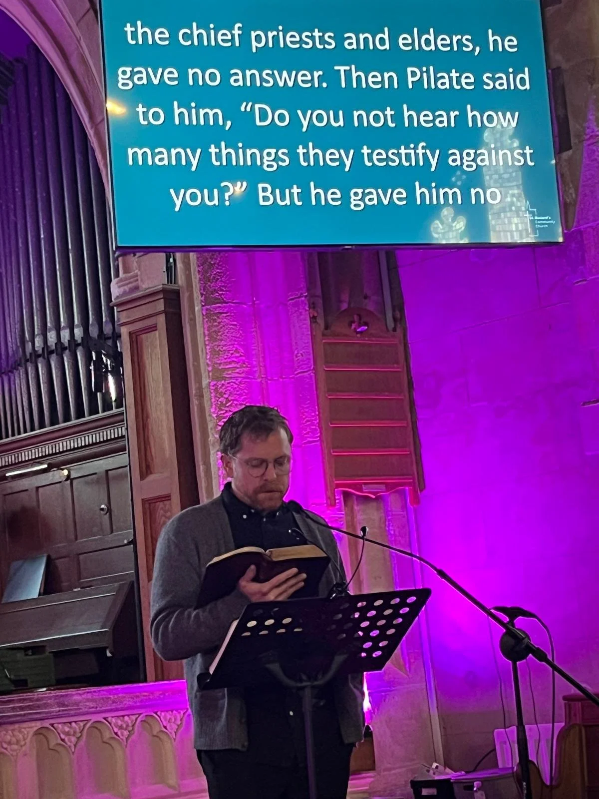 Jeremy reading during Good Friday service