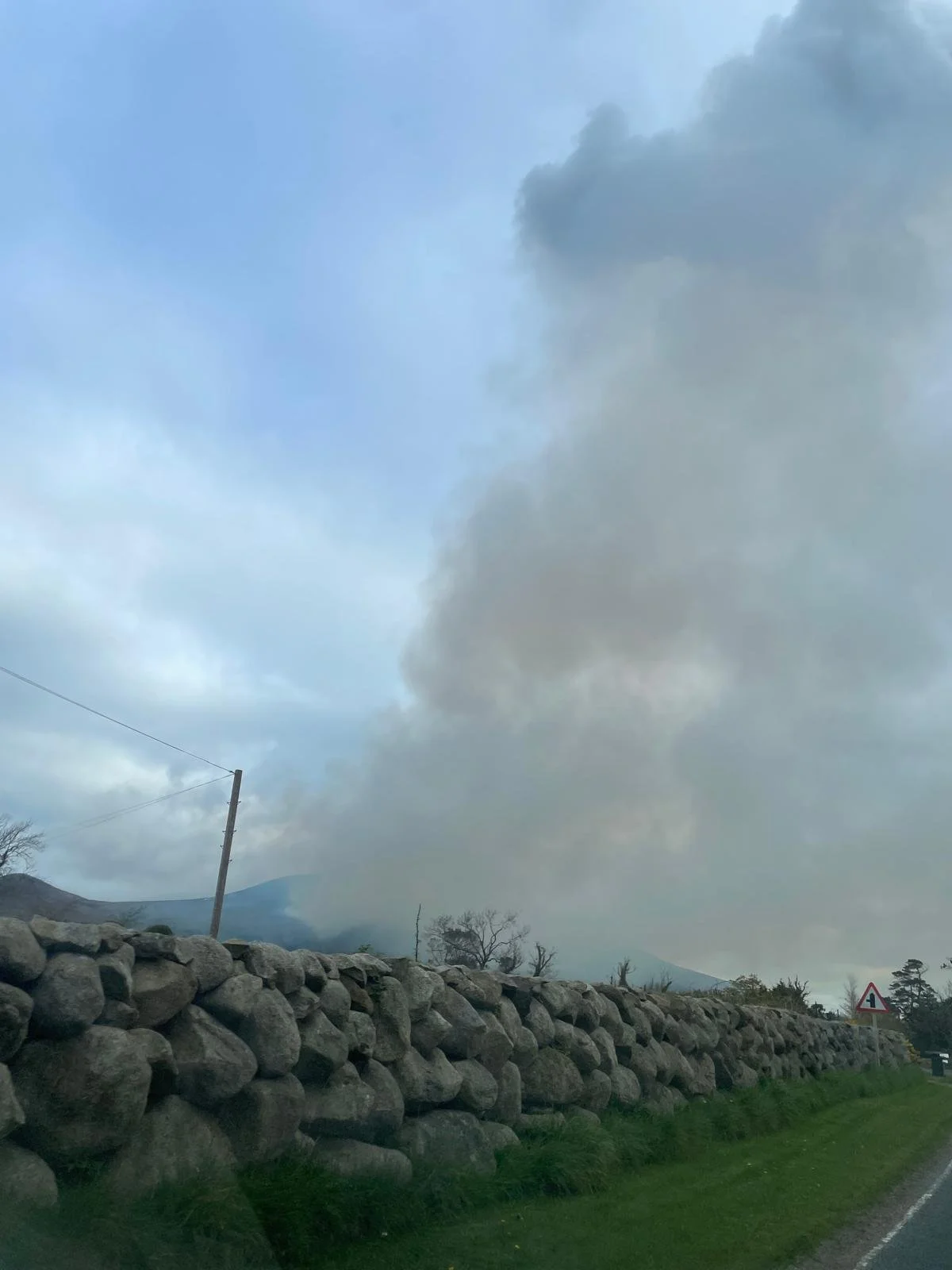  Some smoke we would see on our drive to school from the Mourne Fires. The fires came down real close to peoples gardens and livestock, and no one batted an eye. 