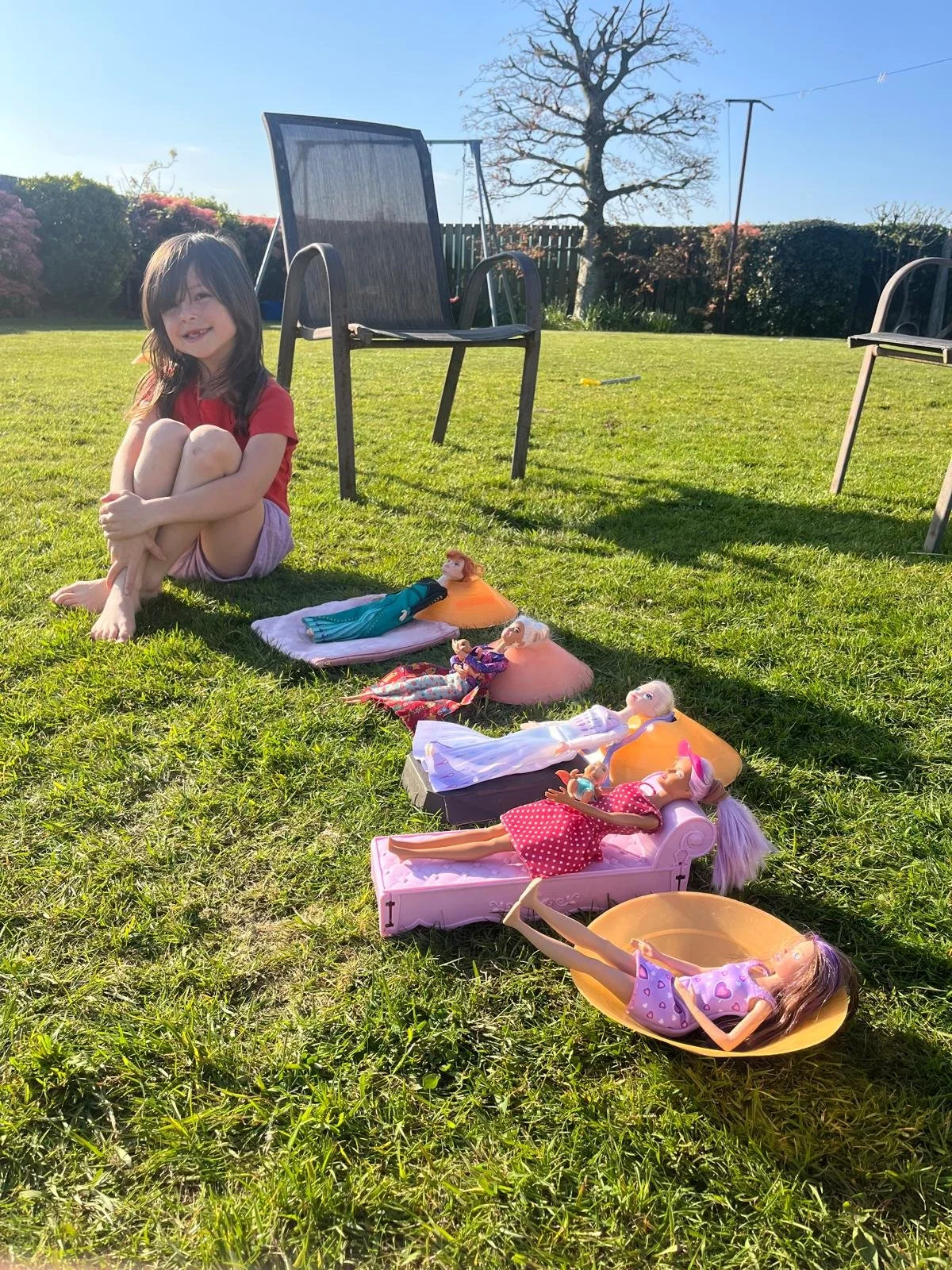When the sun is out, even the dolls need to get their Vitamin D!