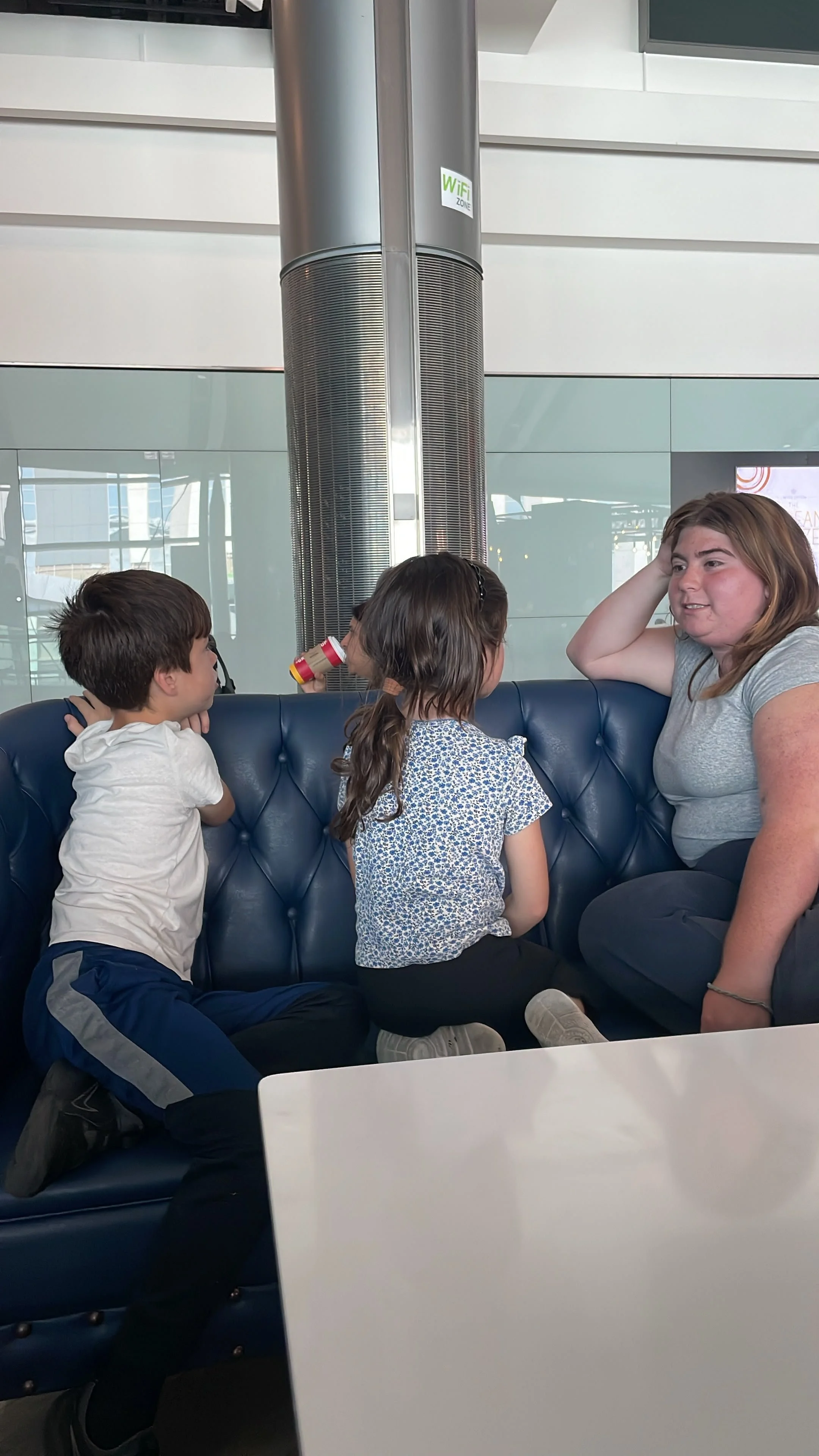 Two excited kiddos welcoming family