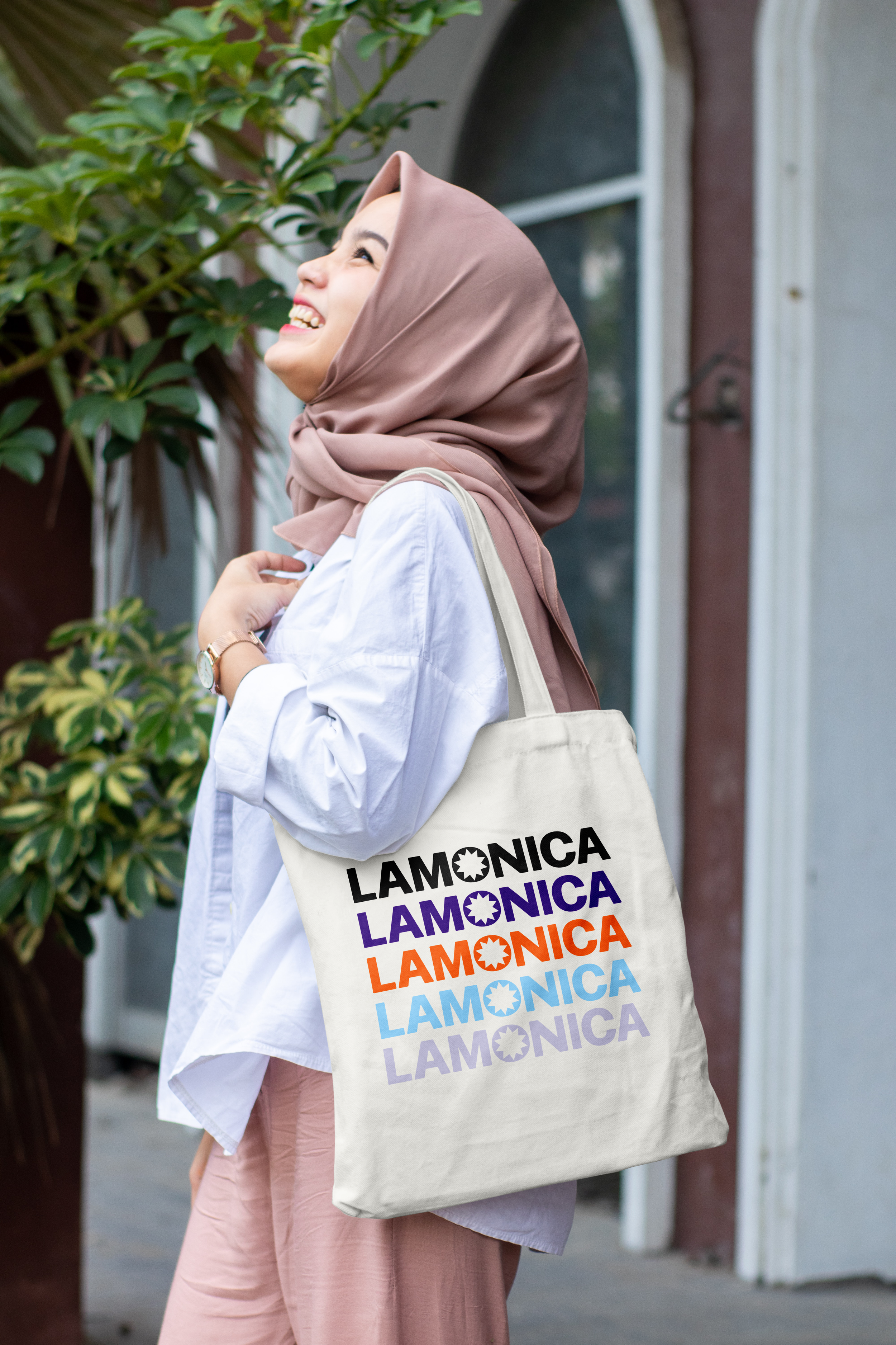 Free Woman Wearing Tote Bag Mockup.png