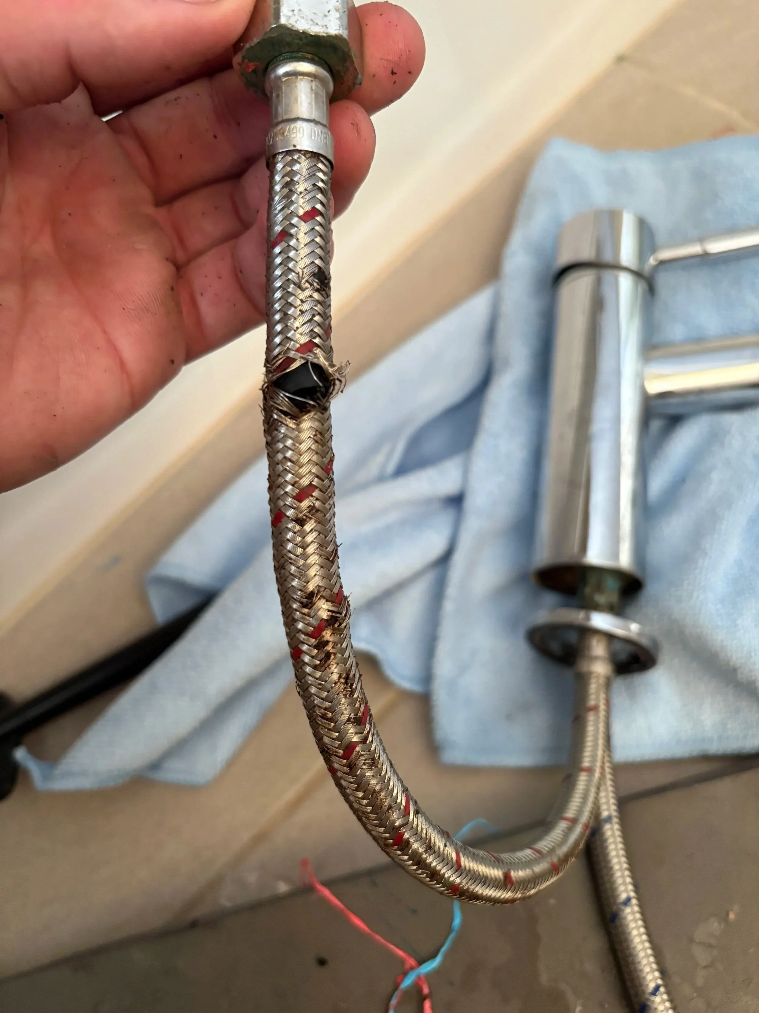 Burst mixer hose in Altona