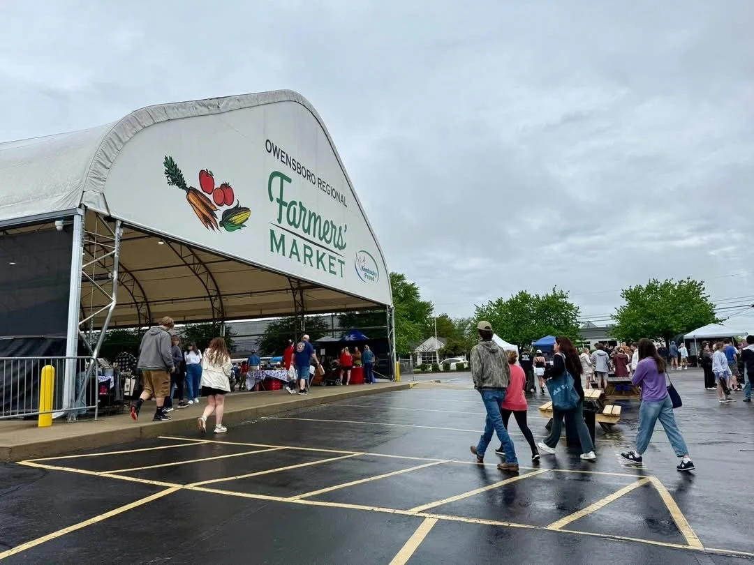 Opening Day at the Market: Cold Rain and Spring Resolve