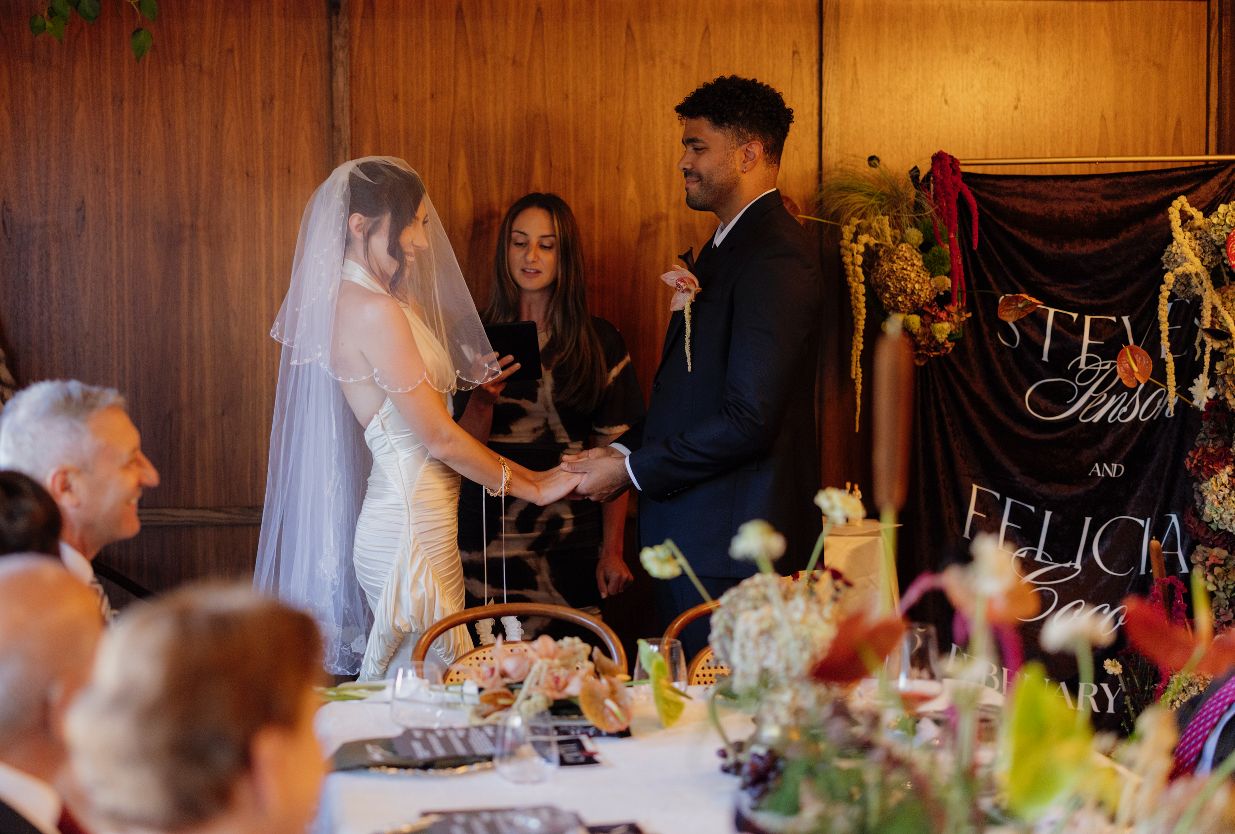 Bride and groom exchanging vows during a legals only wedding ceremony at a restaurant in Prahran Melbourne