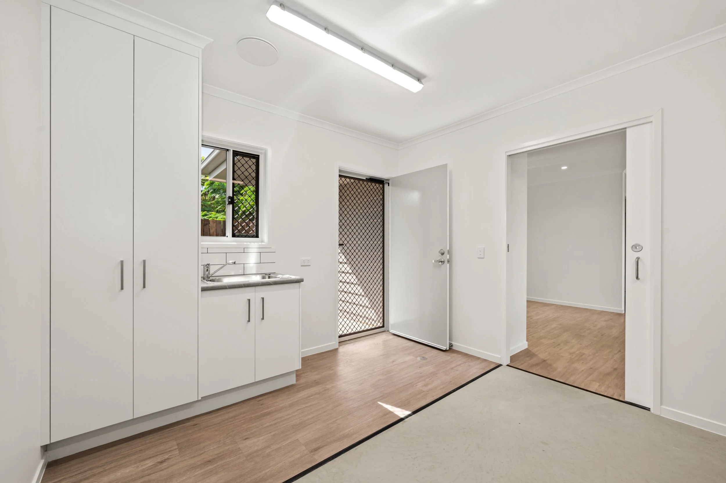 Real estate photo of a Bundaberg residence capturing bright lounge spaces, neutral styling and welcoming home presentation.