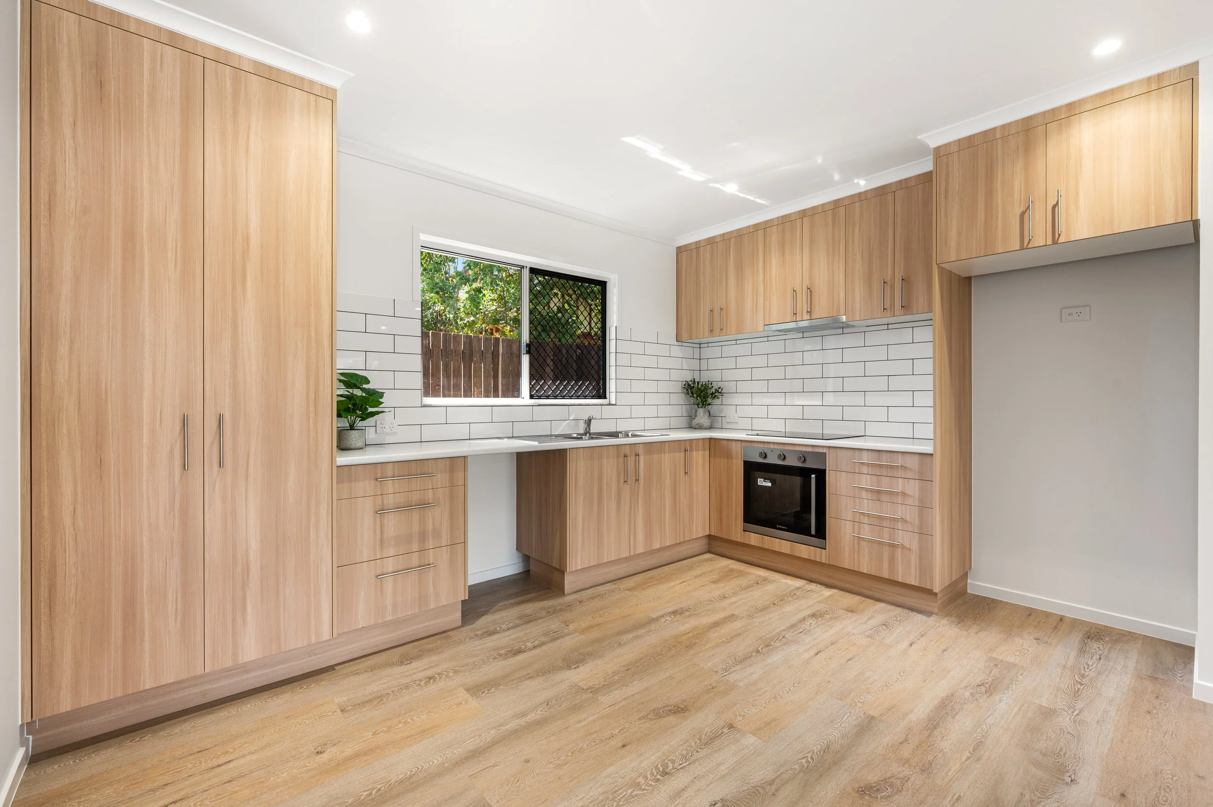 Professional real estate image of a newly completed Bundaberg unit showcasing stylish bathroom design, clean finishes and move-in ready interiors.