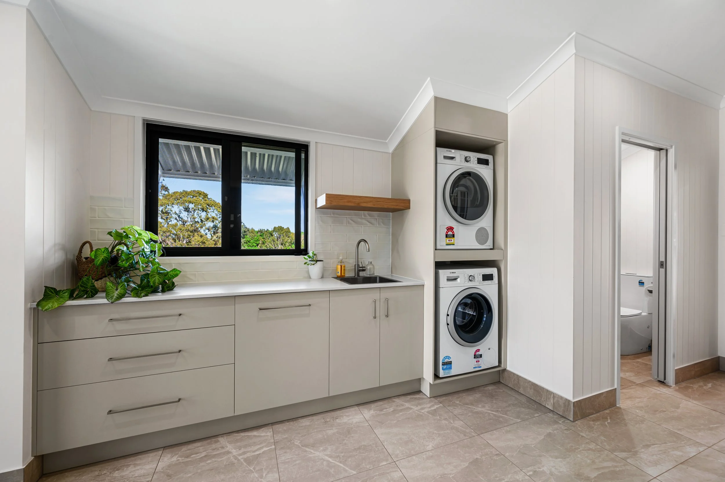Premium renovation image of a Bundaberg property highlighting custom joinery, quality craftsmanship and stylish modern interior upgrades.