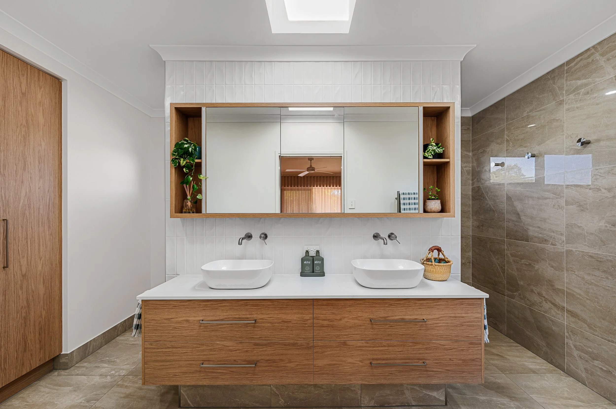 High-end home renovation photo in Bundaberg capturing seamless indoor outdoor living areas and beautifully upgraded entertaining spaces.