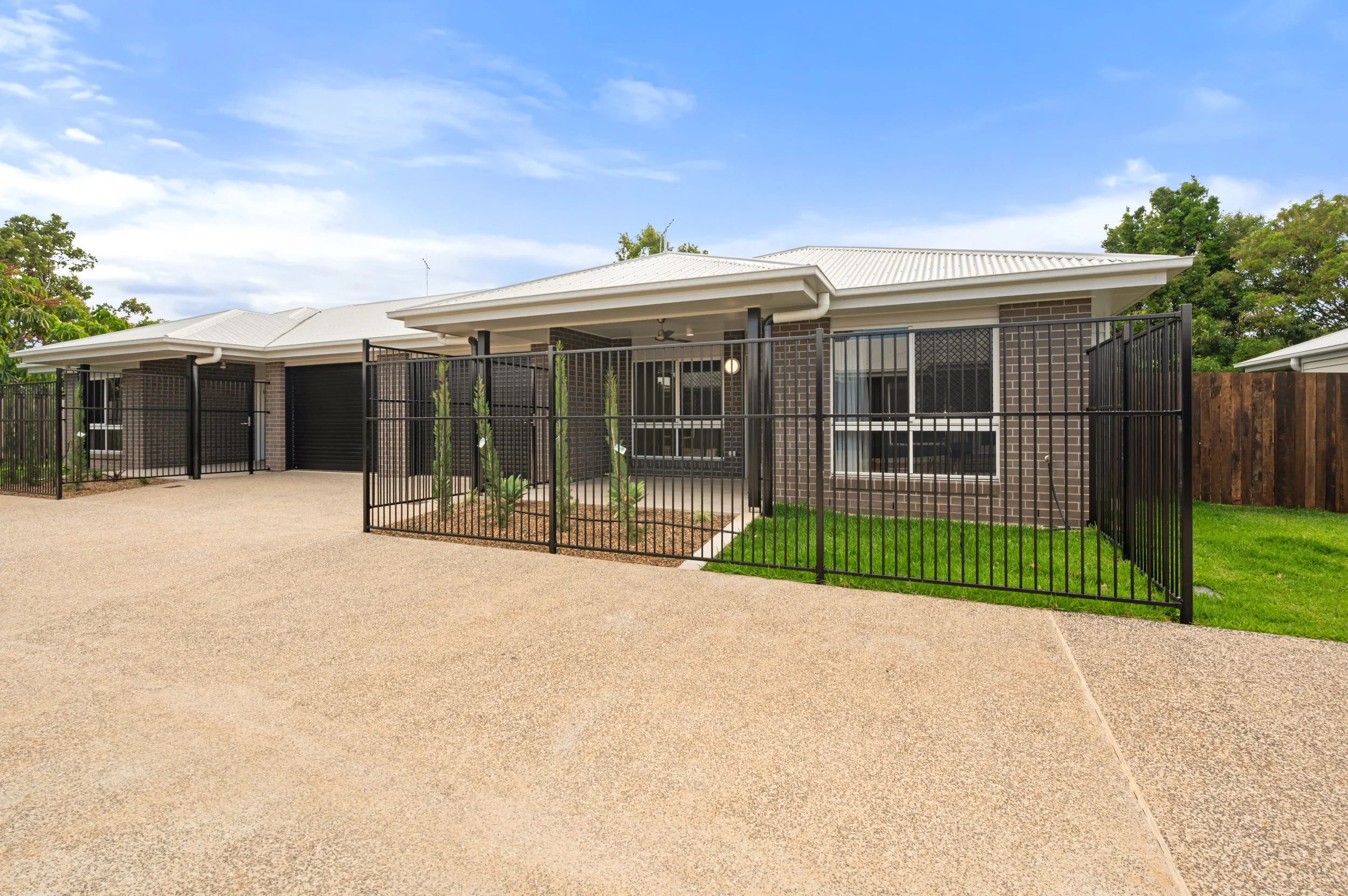 Real estate marketing image of a Bundaberg property showcasing outdoor entertaining areas, covered patio space and backyard appeal.