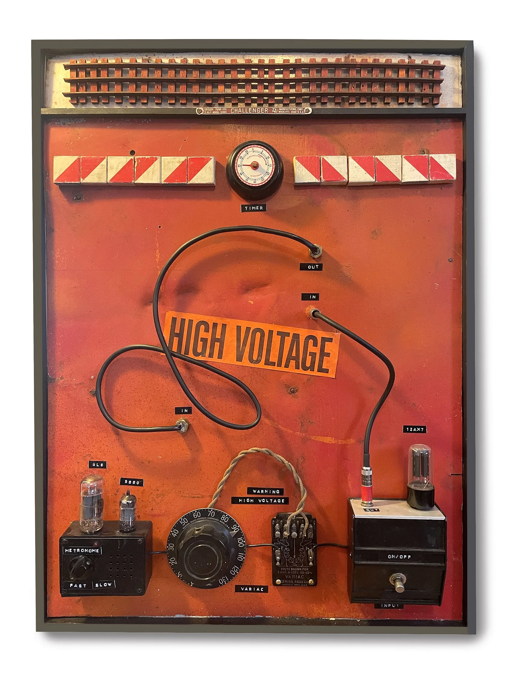 High Voltage, 2025 /
recycled sign, wire, electronic parts, railroad track / 24 x 30 inches