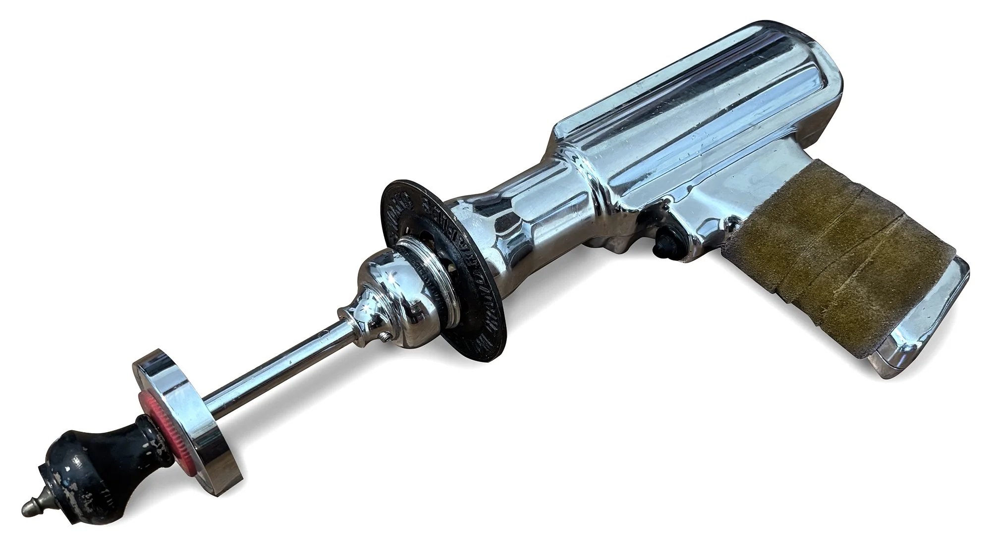 Raygun Pistol, 2026 / upcycled timing gun, Plumbing parts, leather handle /
15 x 7 inches 


