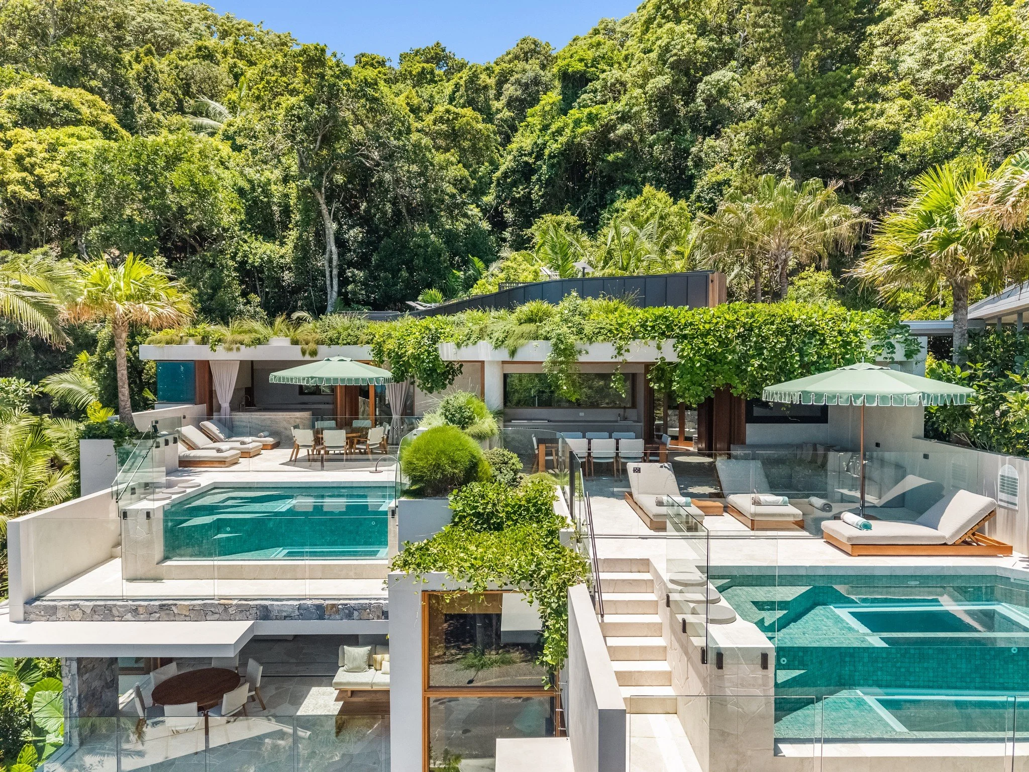 Birds eye view of the lush rainforest and the most easterly residence in Australia🍃