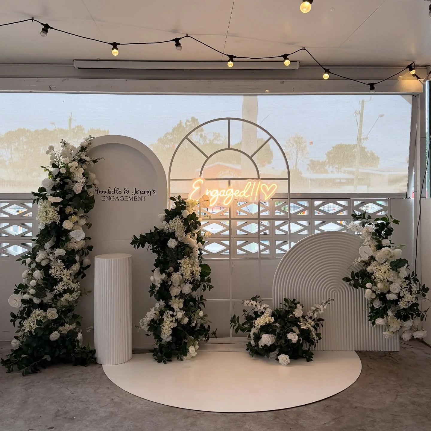 ✨ Elegant custom backdrop setup for Annabelle &amp; Jeremy&rsquo;s engagement ✨
Featuring custom florals and modern arches, the perfect statement for your special day.

Now taking bookings for 2026! 🌸

Venue- @kamiburleigh 
.
.

#EngagementStyling #