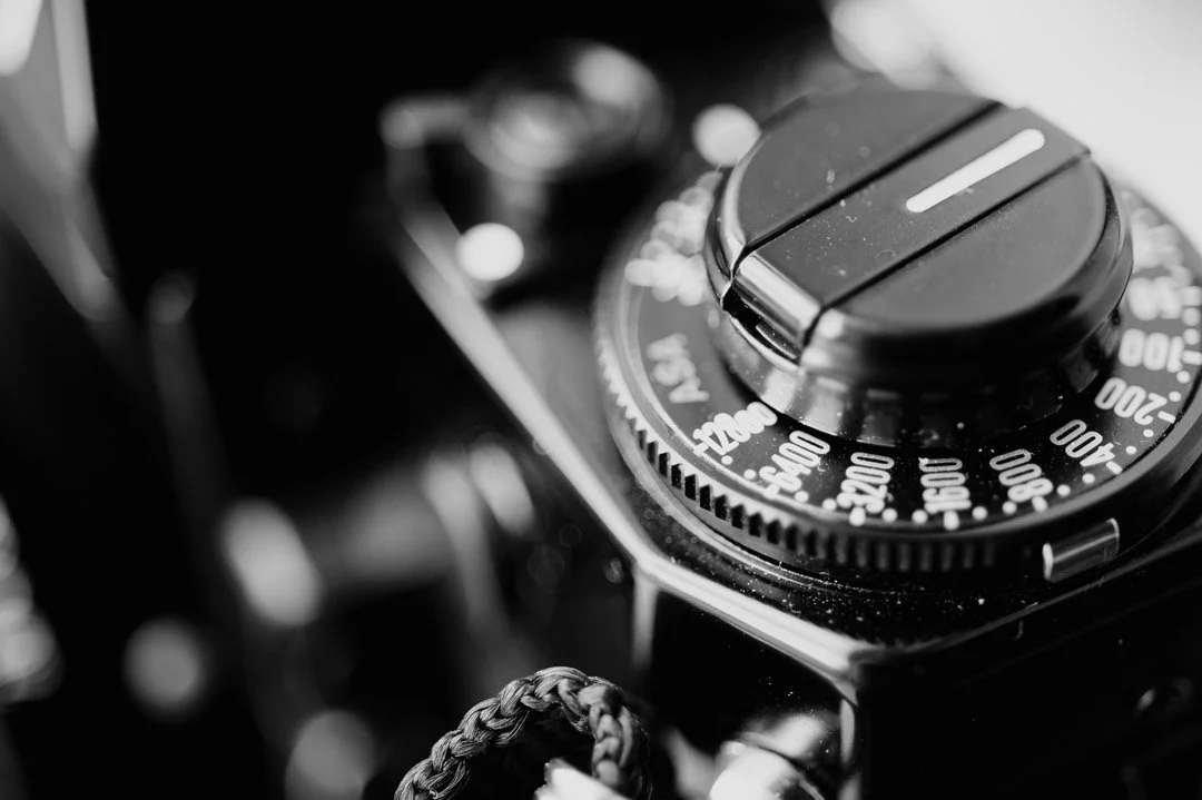 black and white image of canon a-1 iso dial