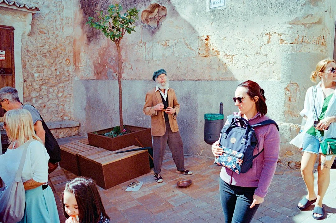 man with beard singing at Alcudia Market Majorca