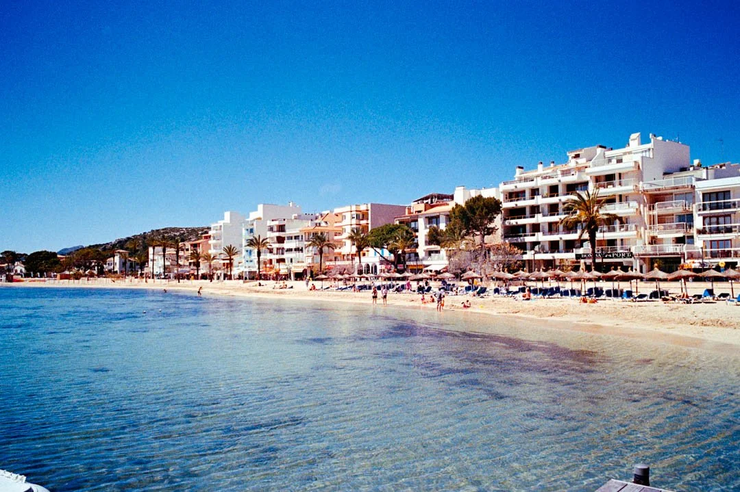 Blue ocean with hotels on beach, Puerto pollensa
