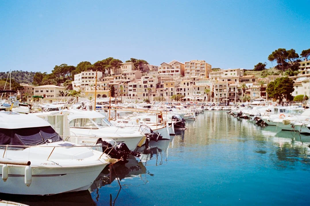 white boats port de soller harbour on sunny day