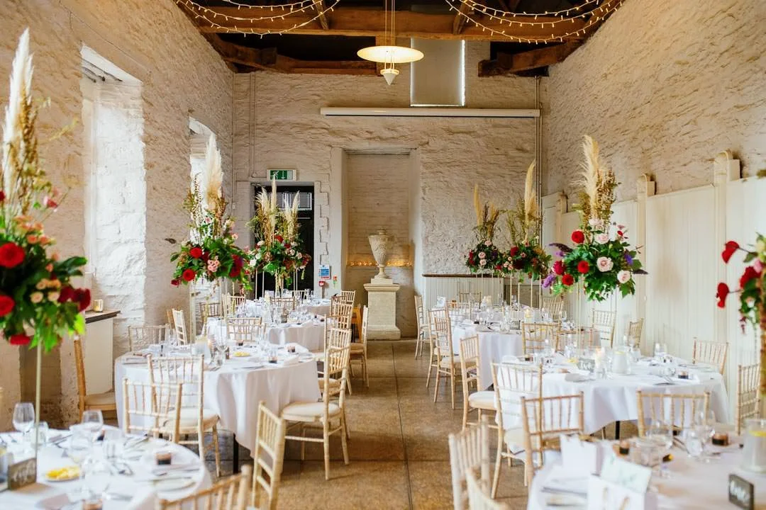 wedding tables with floral decorations and candles, Hestercombe House Somerset