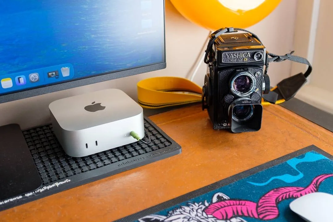 Yashica mat-124G film camera on a desk next to pc screen and computer.