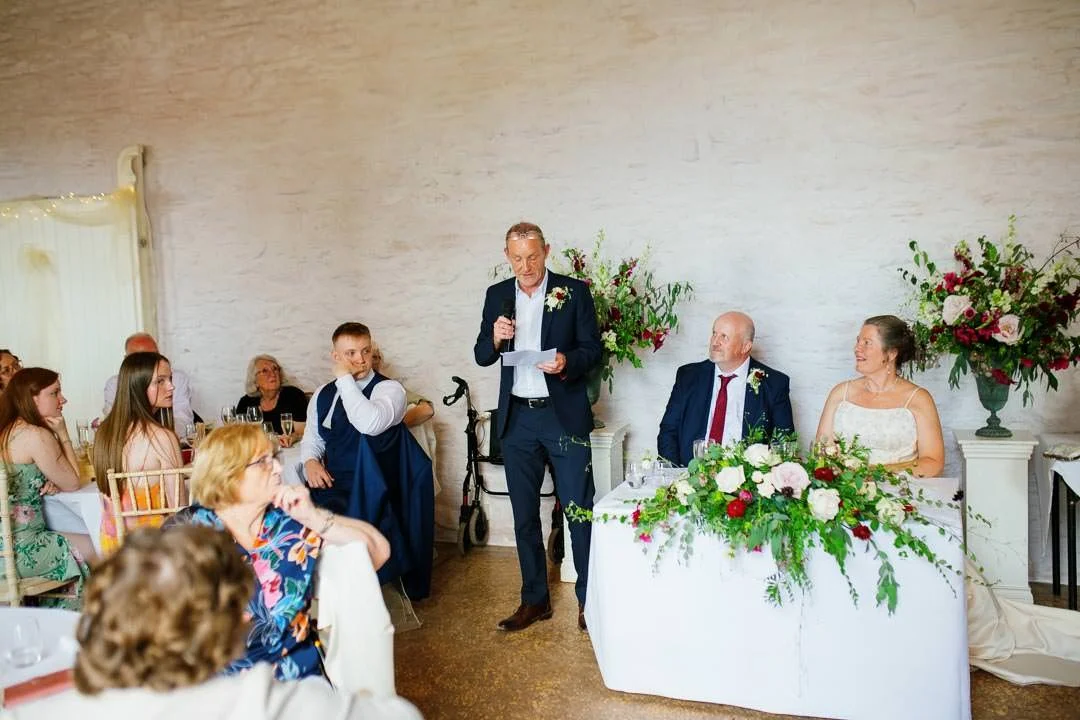 man in blue suit making a speech at wedding, Hestercombe House Somerset