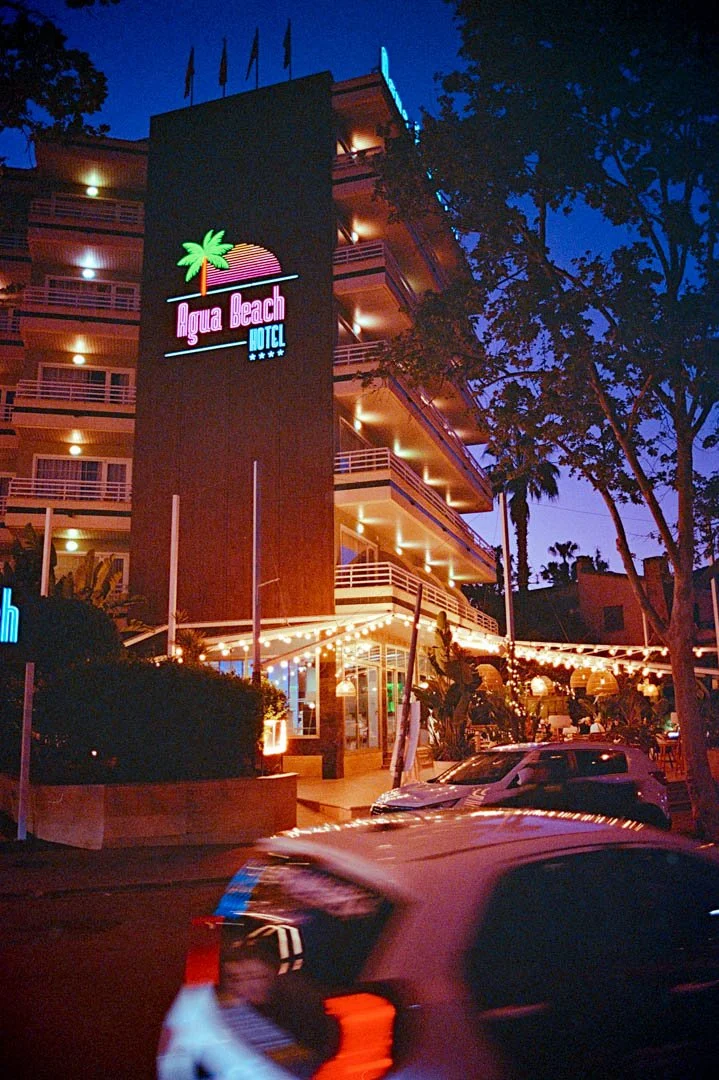 aqua beach hotel at night with neon lights, Palma Nova