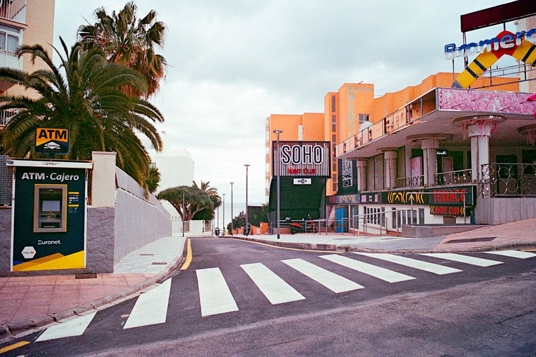 Night clubs with palm trees in road, Magaluf Majorca