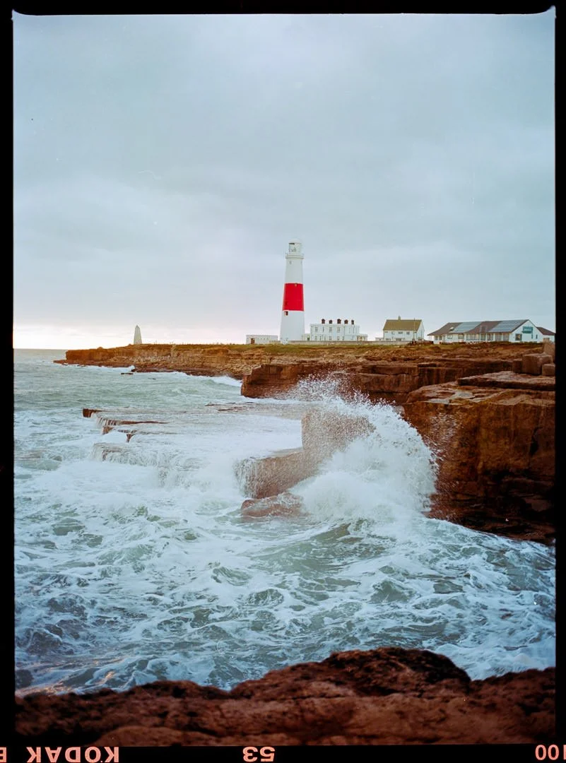 Portland Bill lighthouse with crashing waves and stormy sky, Kodak Ektar 120